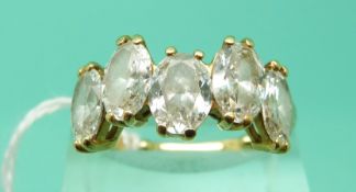 An 18ct gold ring set with five oval brilliant diamonds, signed Kutchinsky,