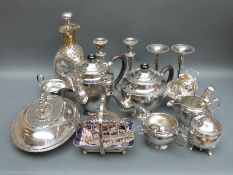 A quantity of silver plated items including teaware, dimple decanter,