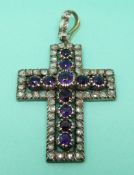 An early 19thC cross pendant set with amethyst and rose cut diamonds