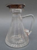 An Edward VII hallmarked silver mounted cut glass whisky noggin,