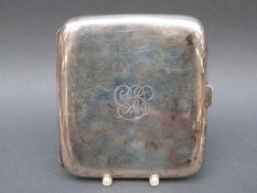 A George V hallmarked silver carved cigarette case, Birmingham 1910,