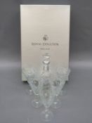 A Royal Doulton boxed cut glass decanter and glass set