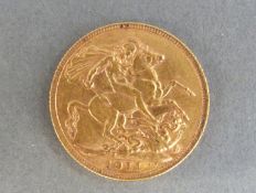 A 1911 gold full sovereign.