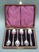 A cased set of six hallmarked silver tea or coffee spoons,