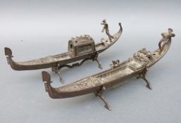 A pair of cast metal Venetian gondolas, one with fitted inkwell, length 30.