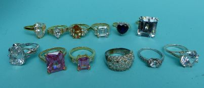 Nine rings set with cubic zirconia and three silver rings