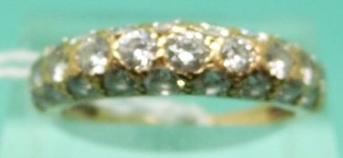 An 18ct gold ring set with 30 round brilliant cut diamonds,