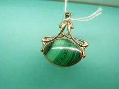 A 9ct gold swivel pendant in Art Nouveau style set with lapis lazuli to one side and malachite to
