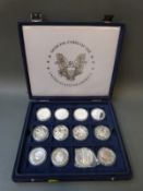 A collector's case containing twenty four various commemorative crowns, some thought to be silver,