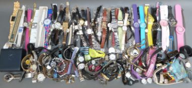 A large collection of various ladies and gentleman's wristwatches including Timex, Accurist,