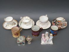 A 19thC continental hand decorated cabinet cup and saucer, miniature Meissen vase,