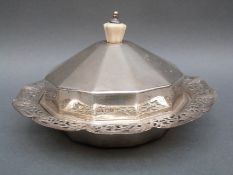 An Art Deco hallmarked silver butter dish with glass liner, the base having pierced decoration,