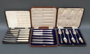A cased set of hallmarked silver handled knives,