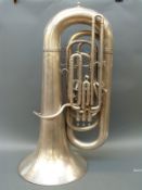 A cased E Flat tuba by Boosey & Hawkes in silvered finish,