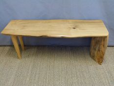 A live edge cherry wood coffee table with mitred end,