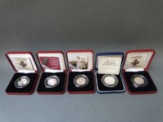 Five cased and certificated silver proof 50 pence coins to include 'Women's Social and Political