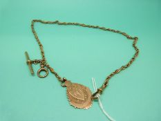 An 9ct gold Albert with alternate rope twist links and fob, weight 23.