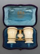 Cased ivory opera glasses in plush case Mr Streeter, New Bond Street,