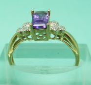 Three 9ct gold rings set with amethyst and diamonds