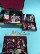 A collection of jewellery including faux pearls, Stratton compact, a collection of watches,