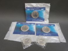 Five silver Britannia coins,