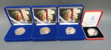 Three cased 2002 Golden Jubilee silver proof crowns together with a 1997 cased Golden Wedding