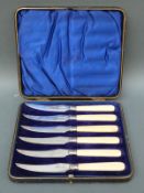A cased set of Edward VII hallmarked silver bladed knives,