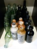 A collection of bottles to include Tetbury, Stroud, Cirencester and Swindon examples,