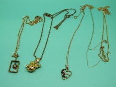 A 9ct gold necklace set with rubies, 9ct gold pendant in the form of a bee,