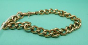 A gold plated bracelet.