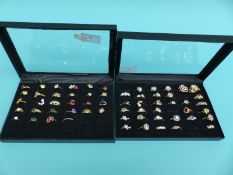 Over 60 rings set with various gemstones
