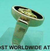 A 14ct gold ring set with a large gold nugget and four diamonds (1.