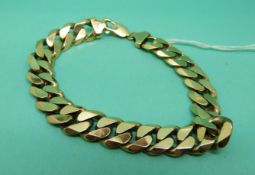 A 9ct gold curb link bracelet, 48.1g.