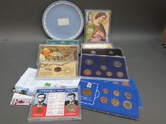 A collection of various cased coin sets etc,