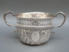 A Victorian Britannia hallmarked silver porringer in the Queen Anne style, London 1899,