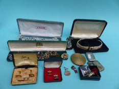 A collection of vintage brooches and necklace, vesta, cufflinks,