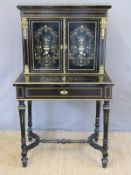 A continental 19thC ebony brass and mother of pearl inlaid gilt metal mounted bonheur du jour,