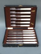 A cased set of hallmarked silver and mother of pearl handled fruit knives and forks, Sheffield 1932,