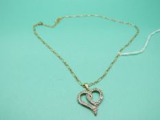 A 9ct gold pendant set with diamonds in the form of a heart on 9ct gold chain, weight 4.