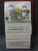 A collection of UK bank notes including some consecutive pairs