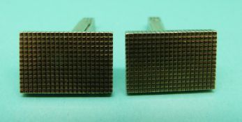A pair of 9ct gold cufflinks with chequered decoration, 14.7g.