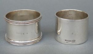 Two hallmarked silver napkin rings, one Chester 1911 the other Birmingham 1927,