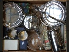 A collection of plated ware including cake stand, toast rack, boxed cutlery,