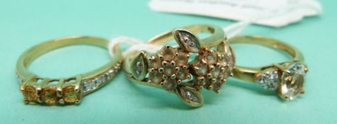 Three 9ct gold rings, one with citrine and diamonds,