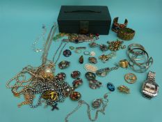 A collection of costume jewellery to include Miracle brooches, tigers eye brooch, Miracle pendant,