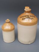 Two Swindon stoneware flagons Godwin Bros and Mason & Co,