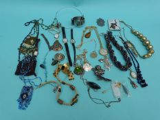 A tigers eye pendant, brooches, Miracle pendants,