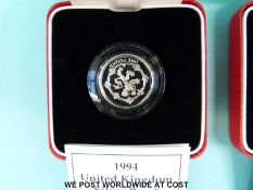 Two cased UK silver proof Piedfort £1 coins with certificates 1993 and 1994
