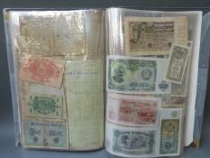 Two folders of circulated world bank notes including inflation examples