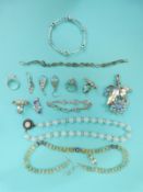 A faux moonstone necklace, moonstone brooch, silver rings set with moonstone,